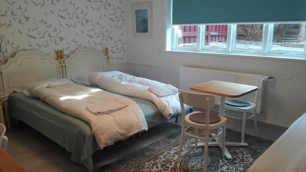 Dreibettzimmer mit Gemeinschaftsbad